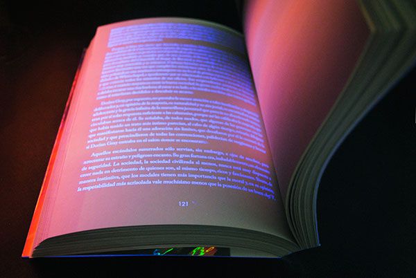 Book that is written in invisible ink which text only shows through UV light.