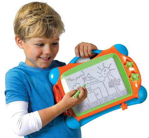 A child holding a magnetic drawing boards while drawing on it. The current drawing is a house, the sun, some grass, a tree, and the kid is drawing clouds.