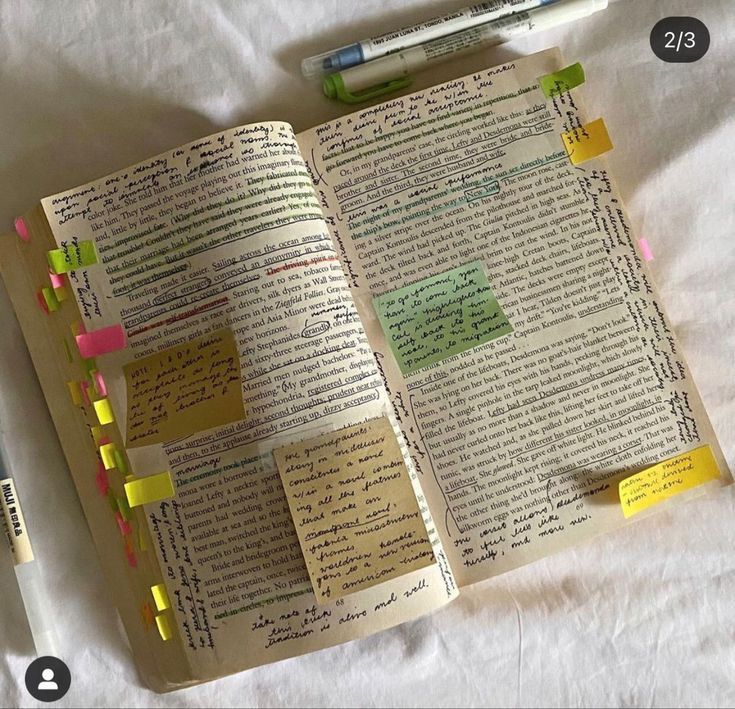 image of a story book with multiple sticky note annotations and book marks