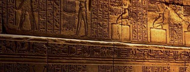 Picture of hieroglyphs on a stone wall with different lighting and texts.